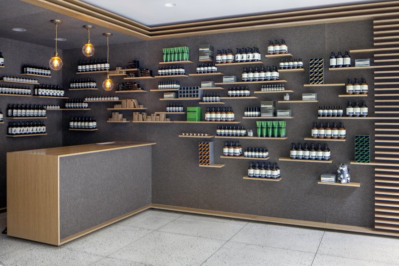 Grey felt-lined walls at Aesop